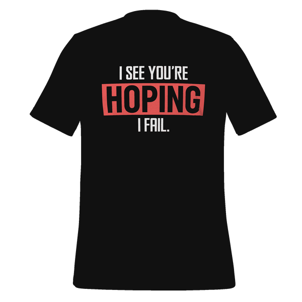 Black t-shirt with humorous text design on a green background