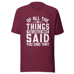 Maroon t-shirt with white text on a transparent background