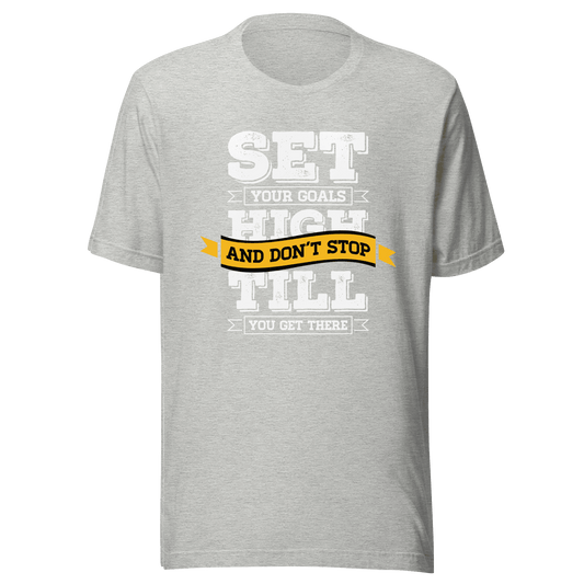Gray t-shirt with motivational quote on a green background