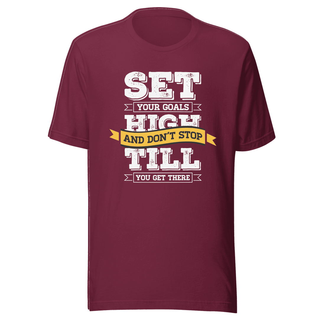 Maroon t-shirt with motivational quote on a green background